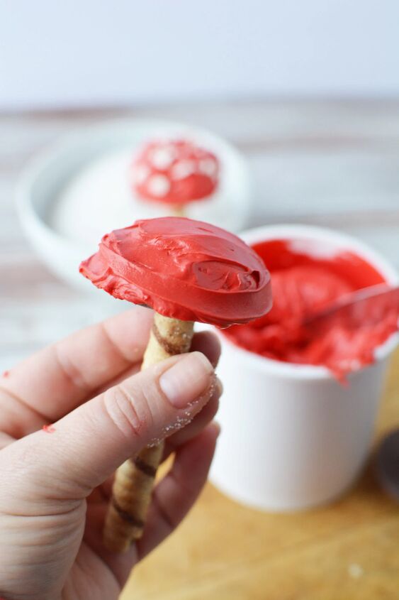 delicious and enchanting woodland fairy toadstool trifle recipe, Red frosting on an edible toadstool