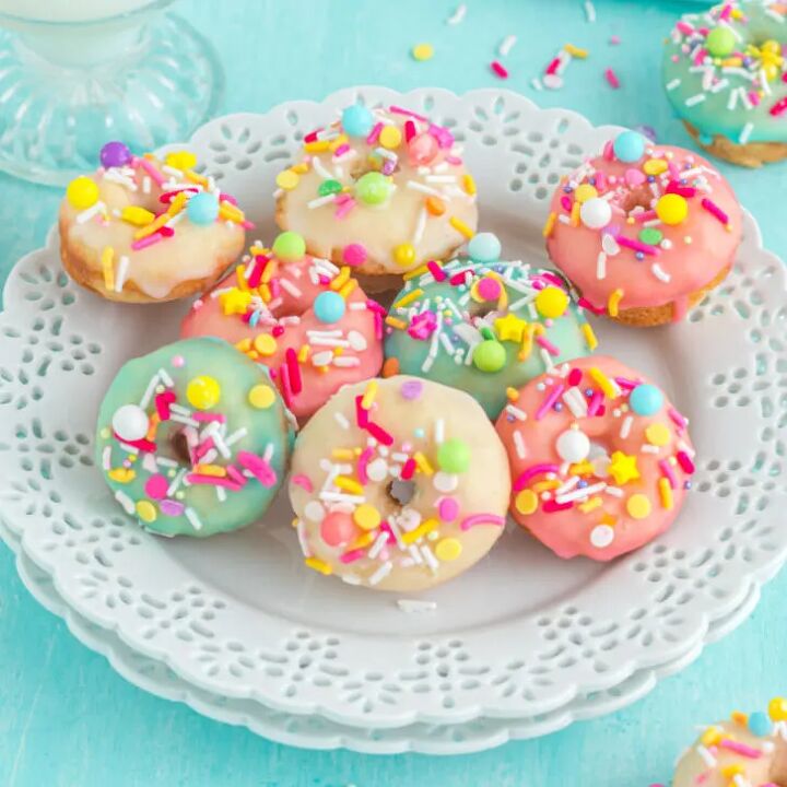 delicious and enchanting woodland fairy toadstool trifle recipe, A plate of colorfully glazed mini donuts with sprinkles