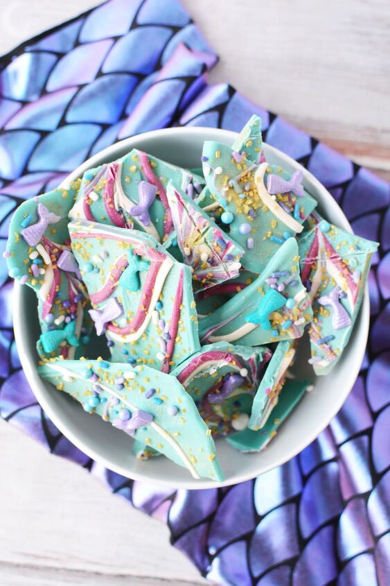 sparkly mermaid bark candy for an easy under the sea sweet, Bowl of mermaid bark candy on top of scale fabric