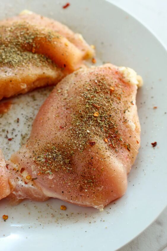 marry me chicken the perfect recipe for a delicious and hearty dinner, Seasoning on raw chicken breasts