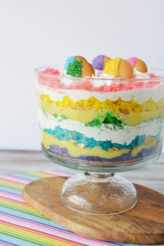 how to make a rainbow trifle dessert for a magical party, Rainbow trifle topped with colored cookies