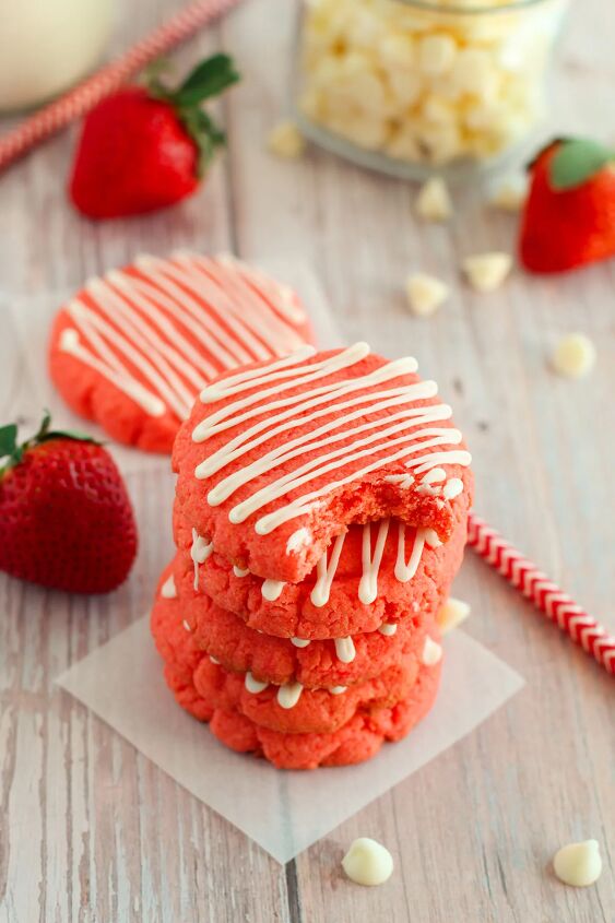 easy and chewy strawberry cake mix cookies recipe, Stack of strawberry cookies with a white chocolate drizzle