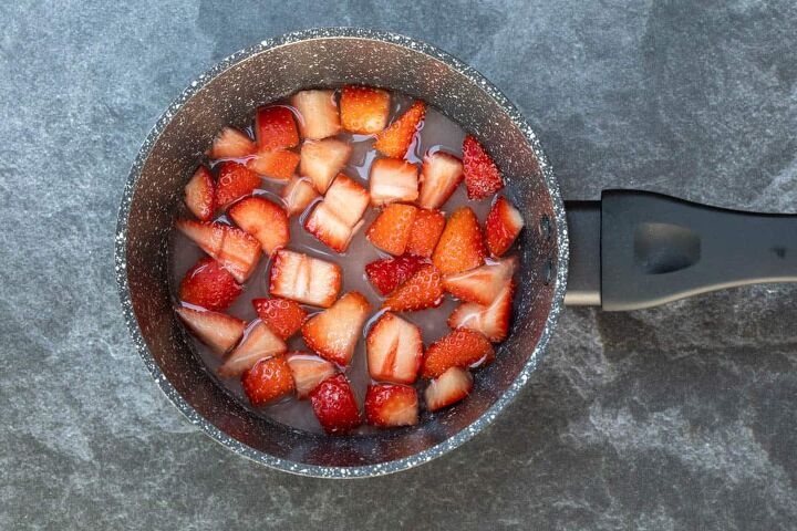 strawberry mimosa, saucepan of chopped strawberries sugar and water