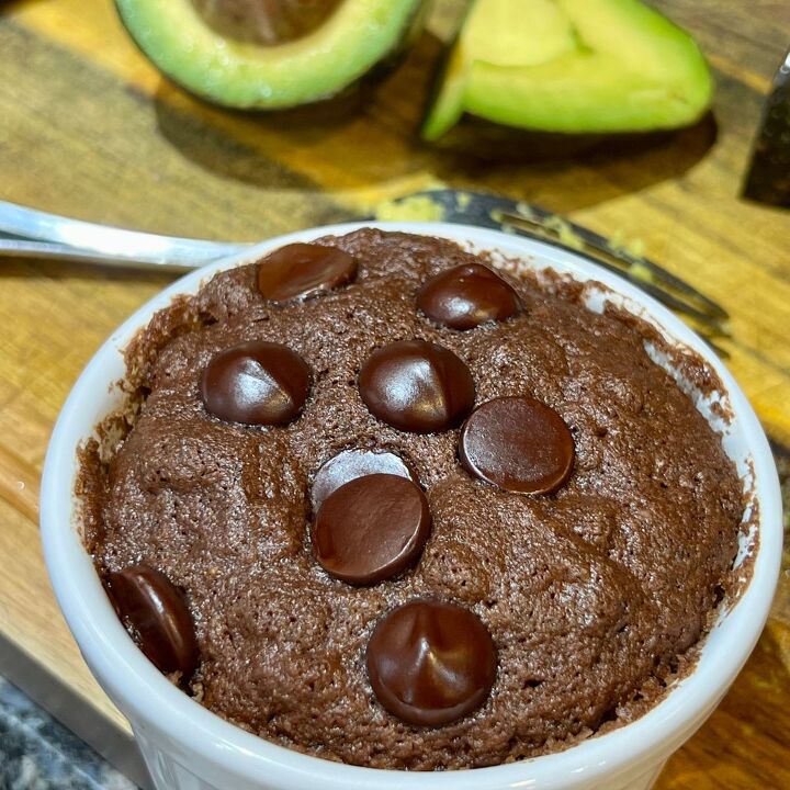 fudgy tik tok mug brownies, Chocolate avocado mug brownie in a white ramekin with sliced avocado