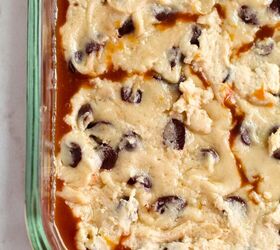 salted caramel chocolate chip cookie bars recipe, Cookie dough on top of a layer of caramel in a baking dish