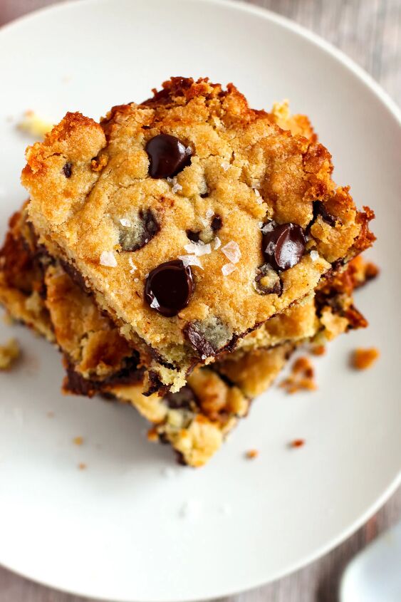 salted caramel chocolate chip cookie bars recipe, Overhead image of salted caramel cookie bars on a plate