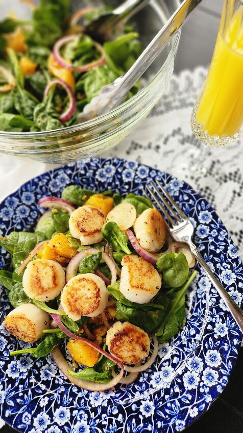scallop salad recipe with orange honey walnut vinaigrette, overhead of scallop salad with orange mimosa on side