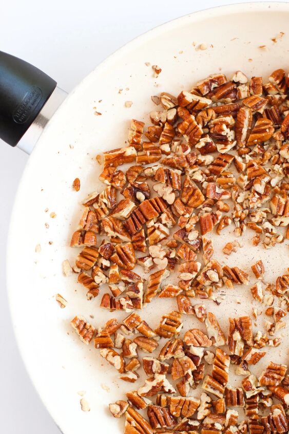 rich and nutty brown butter bourbon cookies, Chopped pecans in a skillet