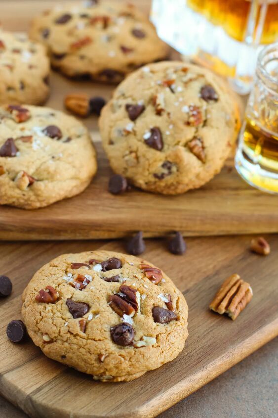 rich and nutty brown butter bourbon cookies, Bourbon chocolate chip pecan cookies on boards