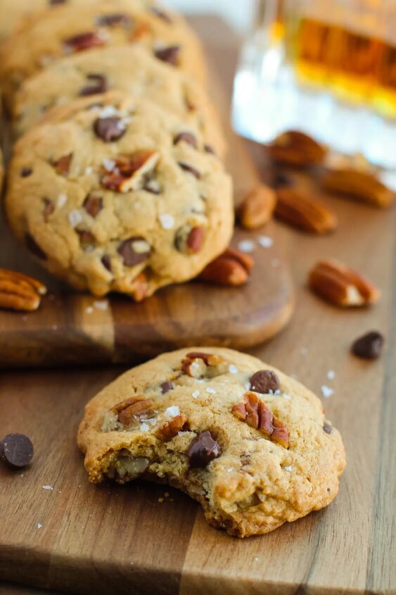 rich and nutty brown butter bourbon cookies, Chocolate chip cookies with pecans and one with a bite missing