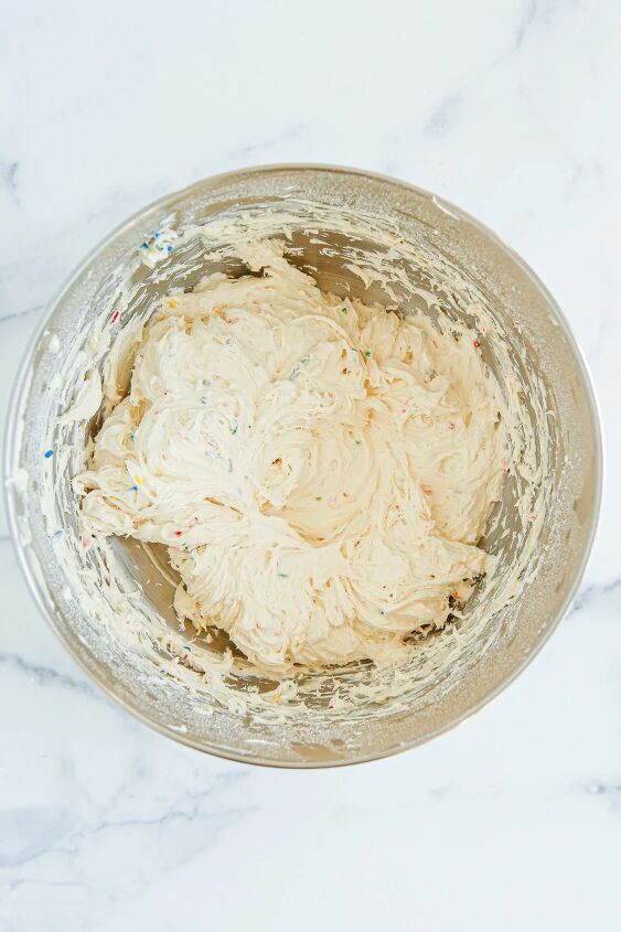 funfetti cream cheese ball dip, Cream cheese ball coming together in a mixing bowl