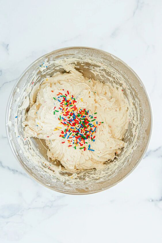 funfetti cream cheese ball dip, Sprinkles on top of cream cheese mixture in a bowl