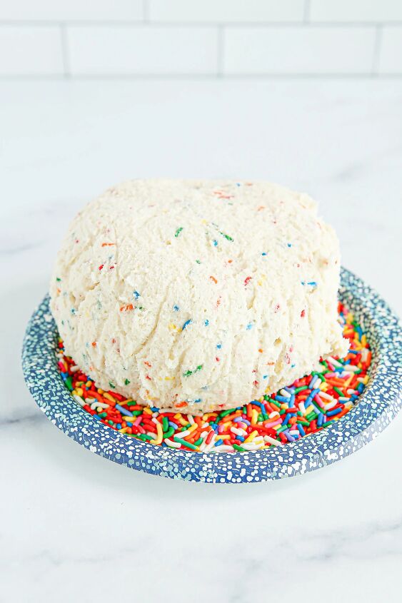 funfetti cream cheese ball dip, Cheese ball dip on top of sprinkles on a plate
