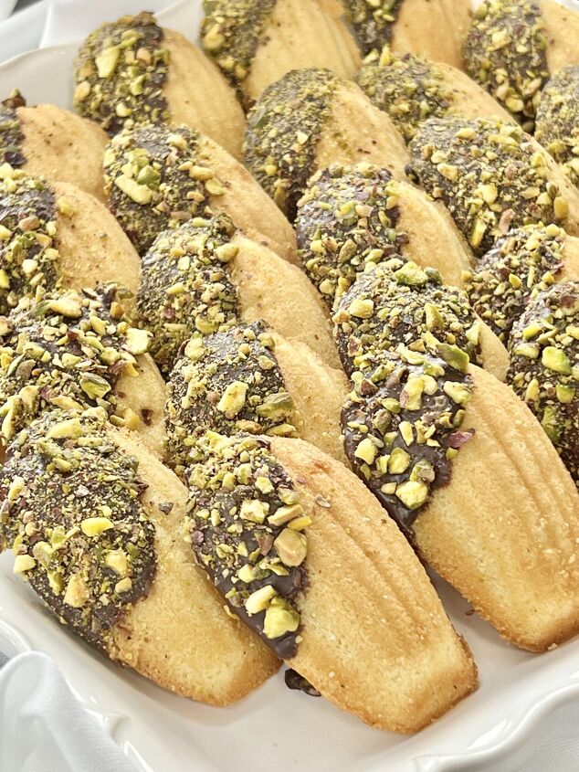 a simple and easy bruschetta baguette appetizer recipe, Madeleine cookies dipped in chocolate and chopped pistachio nuts