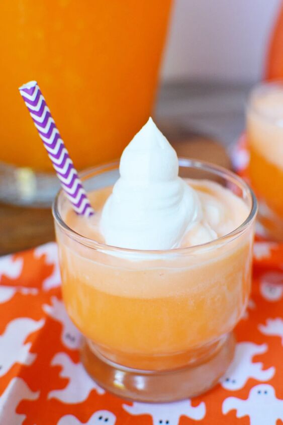 spooky ghost punch, Whipped cream that looks like a ghost on top of orange ice cream punch