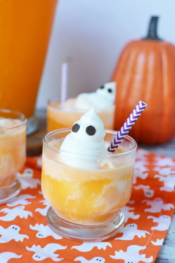 spooky ghost punch, Orange punch with ice cream and whipped cream ghosts with chocolate chip eyes