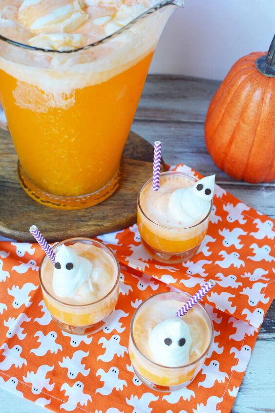 spooky ghost punch, Three cups of orange creamsicle punch topped with whipped cream ghosts