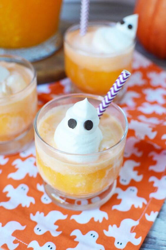 spooky ghost punch, A whipped cream ghost on top of orange punch with ice cream