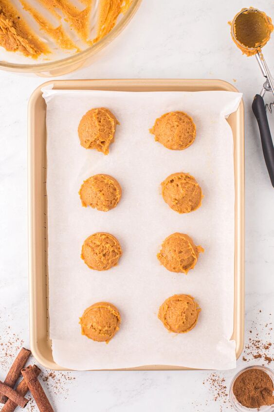 easy pumpkin cookies recipe with frosting, Pumpkin sugar cookie dough on a baking pan