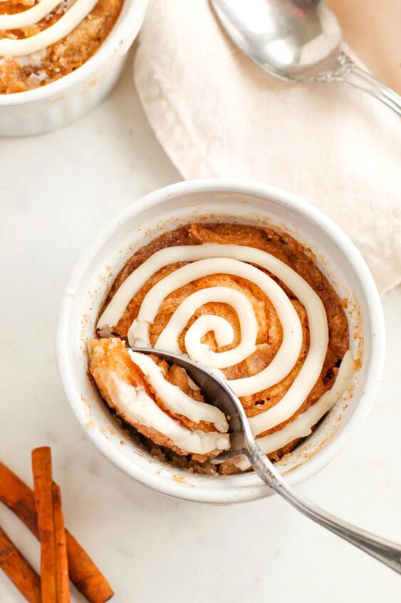 microwave cinnamon roll cake recipe, A spoon in a cinnamon roll cake