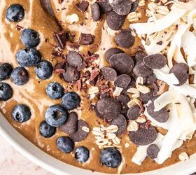 peppermint mocha smoothie bowl, Closeup of a mocha smoothie bowl with blueberries chocolate chips and shredded coconut