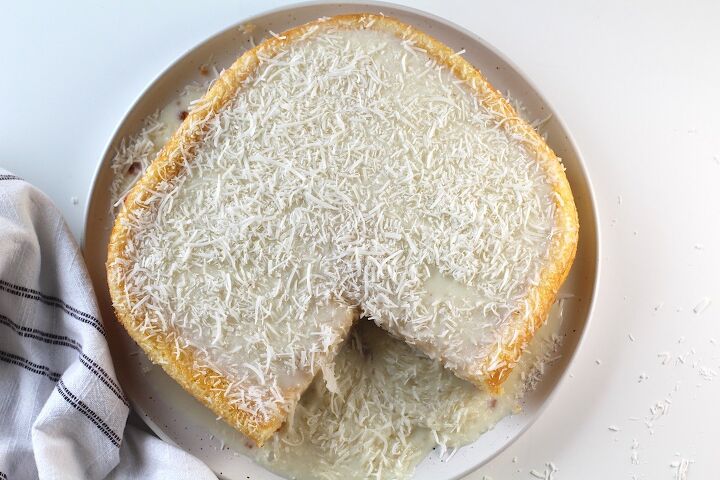 brazilian coconut cake bolo de coco, Brazilian Coconut Cake with a piece taken out