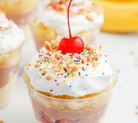 no bake banana split pudding cups recipe, Banana split pudding parfait cups topped with whipped cream cherries and crushed peanuts