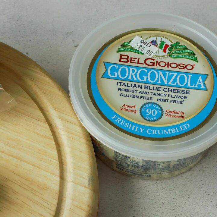 quattro formaggi crusted steak, Tub of crumbled Gorgonzola cheese