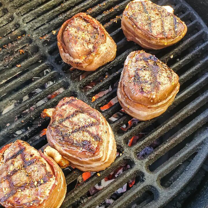 quattro formaggi crusted steak, Bacon wrapped filet mignon on a Big Green Egg grill