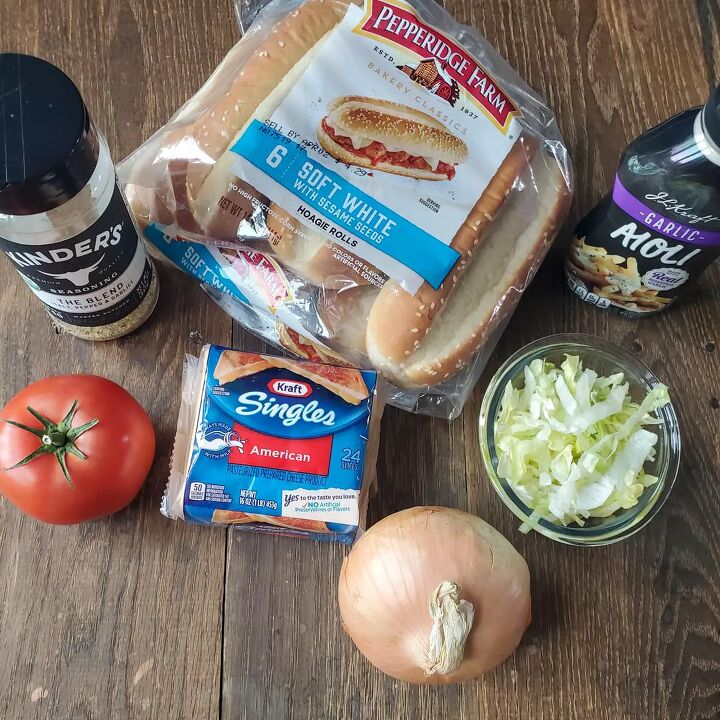 new york chopped cheese sandwich, Ingredients for a chopped cheese sandwich on a wood table