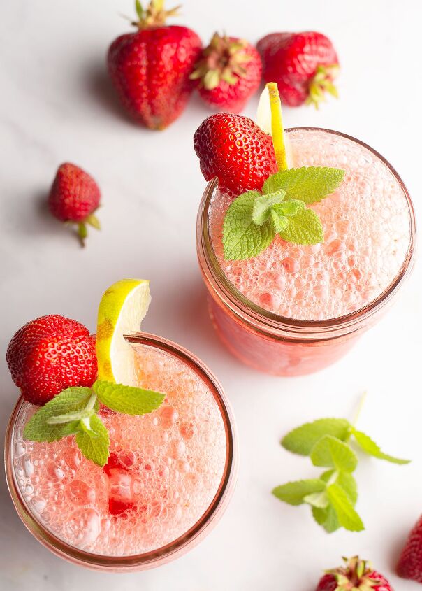 strawberry mint agua fresca, 2 glasses of Strawberry Mint Agua Fresca with garnishes