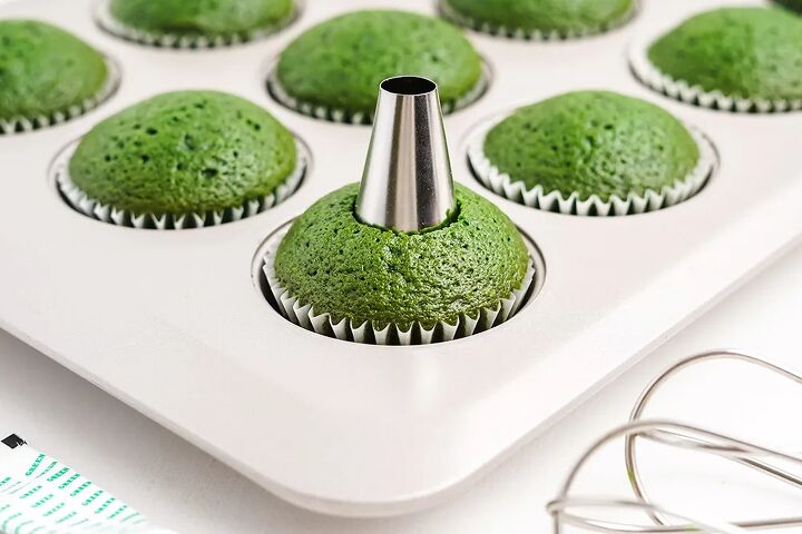 stuffed green velvet cupcakes, Poking a hole in cupcakes for a surprise filling