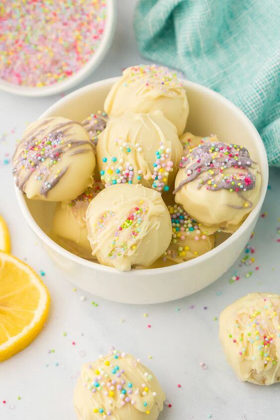 light and creamy lemon oreo truffles, Bowl of yellow oreo truffles with spring colors and sprinkles