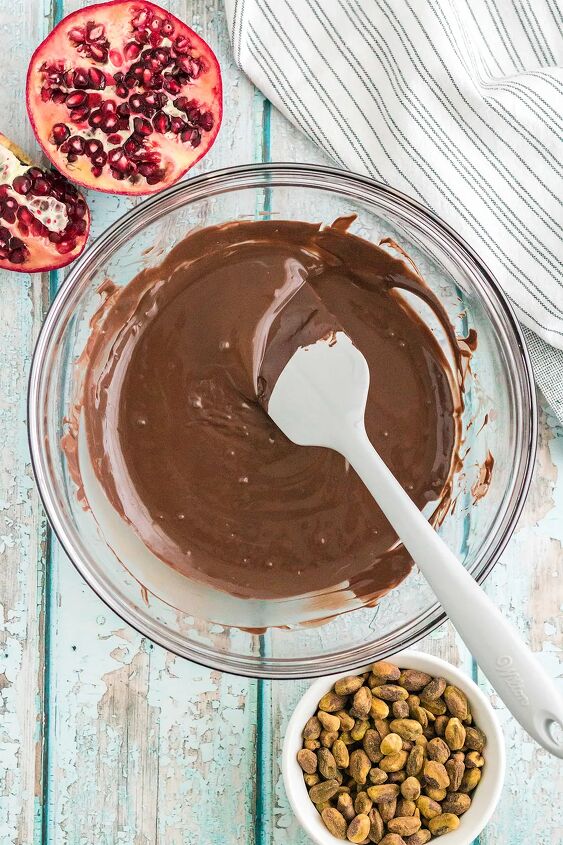 chocolate pomegranate bark with pistachios, Stirring melted chocolate in a bowl