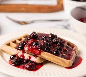 best vegan waffles easy homemade recipe, Vegan waffles topped with berry syrup on a white plate