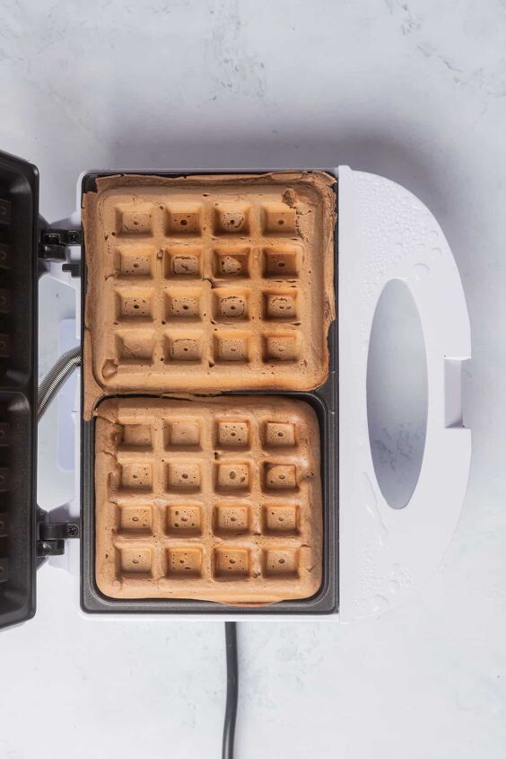 best vegan waffles easy homemade recipe, Two waffles cooking in a waffle maker
