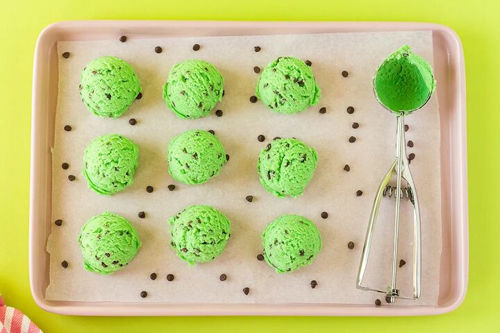 mint chip edible cookie dough, Scoops of mint chocolate chip cookie dough on a baking sheet