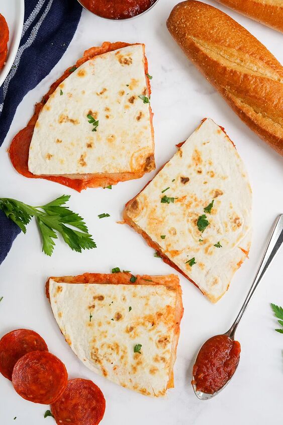 skillet pepperoni pizza quesadillas recipe, Overhead image of quesadilla slices next to bread sauce and pepperoni slices