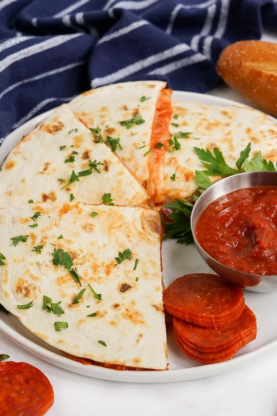 skillet pepperoni pizza quesadillas recipe, Pizza quesadillas on a plate with sauce