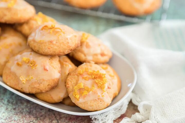 unique carrot cookies with orange juice glaze, Carrot cookies with an orange glaze on a tray
