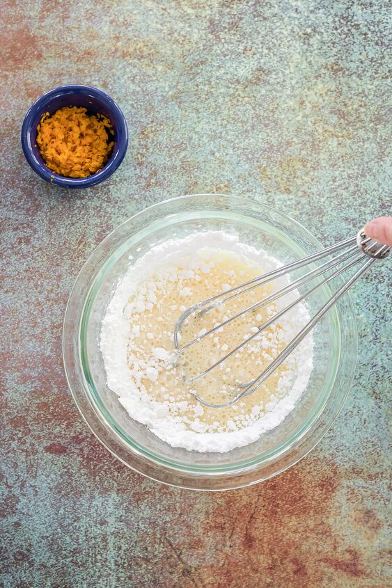 unique carrot cookies with orange juice glaze, Whisking orange juice into powdered sugar