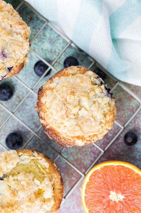 blueberry orange muffins with crunchy oat topping, The top of muffins sitting on a cooling rack