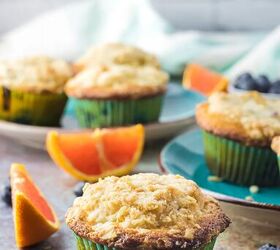 blueberry orange muffins with crunchy oat topping, Blueberry muffins on a table with orange slices