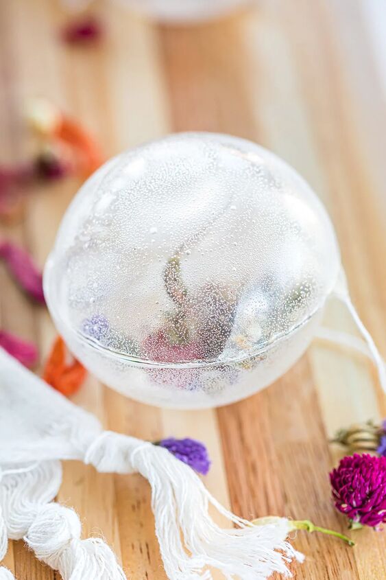diy floral tea globes for blooming flower tea, Clear tea orb with a flower in it