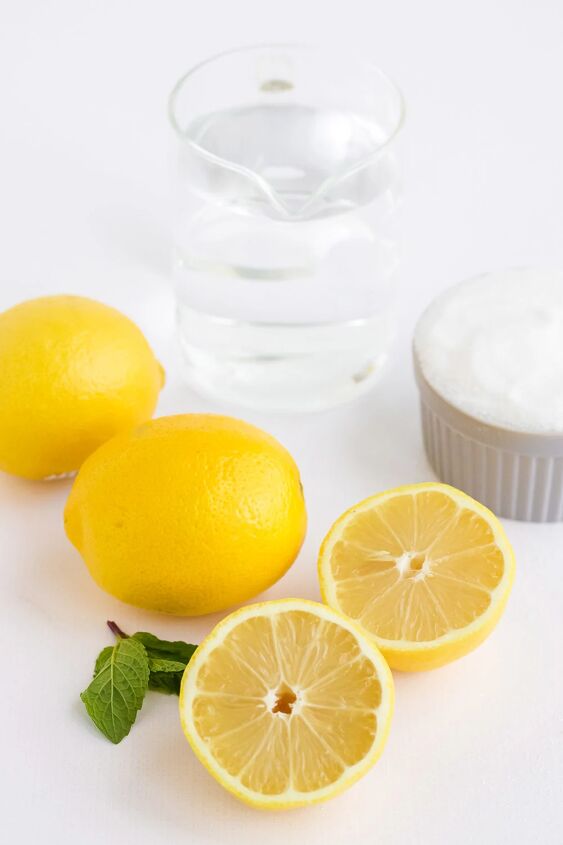 easy and refreshing lemon popsicles, Water lemons and sugar on a table