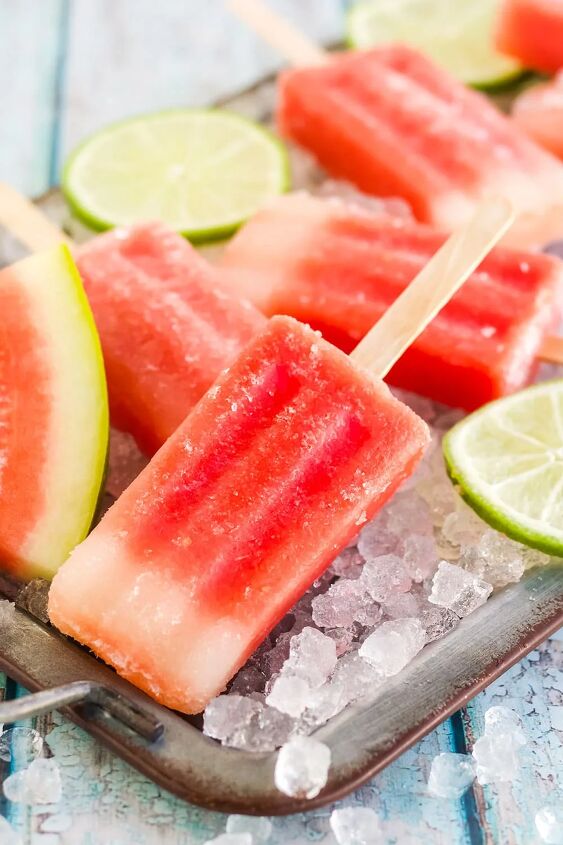 fresh watermelon popsicles recipe, Red popsicles on a tray with watermelon