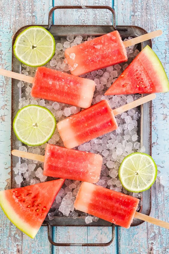 fresh watermelon popsicles recipe, Watermelon popsicles on a tray with ice