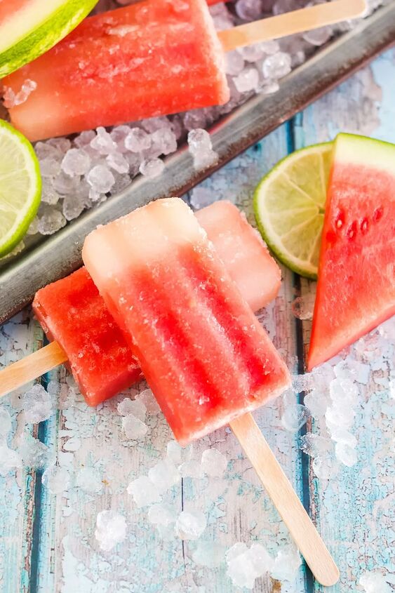 fresh watermelon popsicles recipe, Popsicles on a table next to watermelon