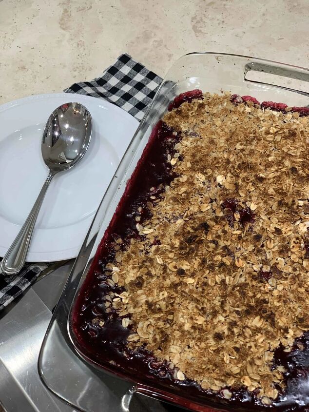 how to make delicious homemade blackberry cobbler, Yum I always have to take a picture immediately after the cobbler comes out of the oven as soon as a family member sees that it is out of the oven they grab a spoon and taste a bite