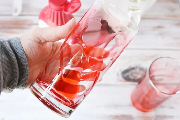 delicious copycat strawberry frappuccino recipe, Pink syrup in a clear glass